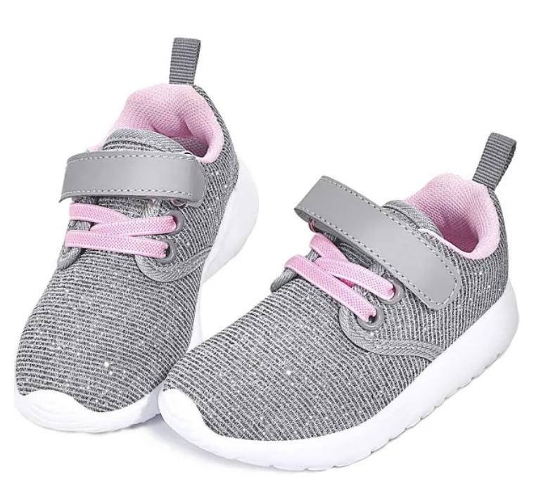 Gray and pink children's sneakers with white sole and velcro strap