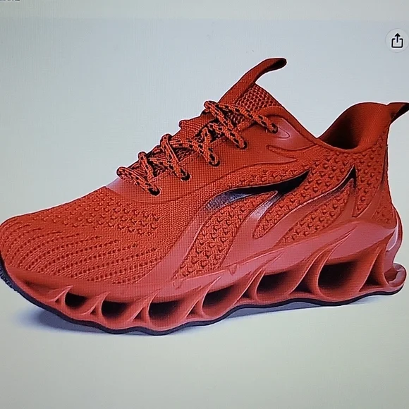 Red running shoe with wave-patterned sole design for children