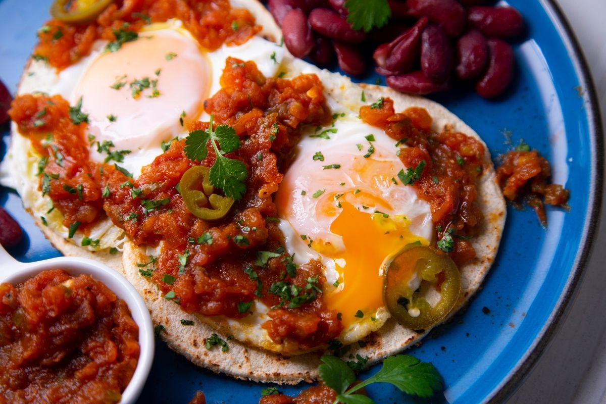 Huevos rancheros with red beans