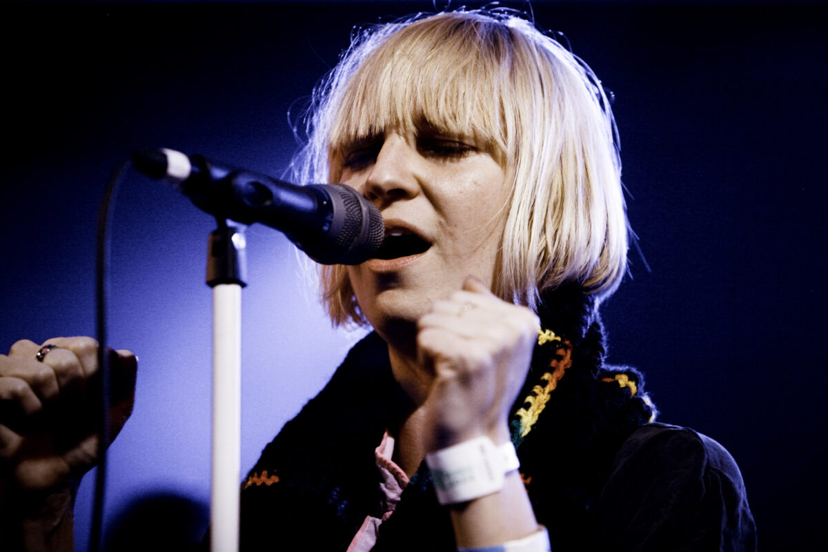 sia performing with mic