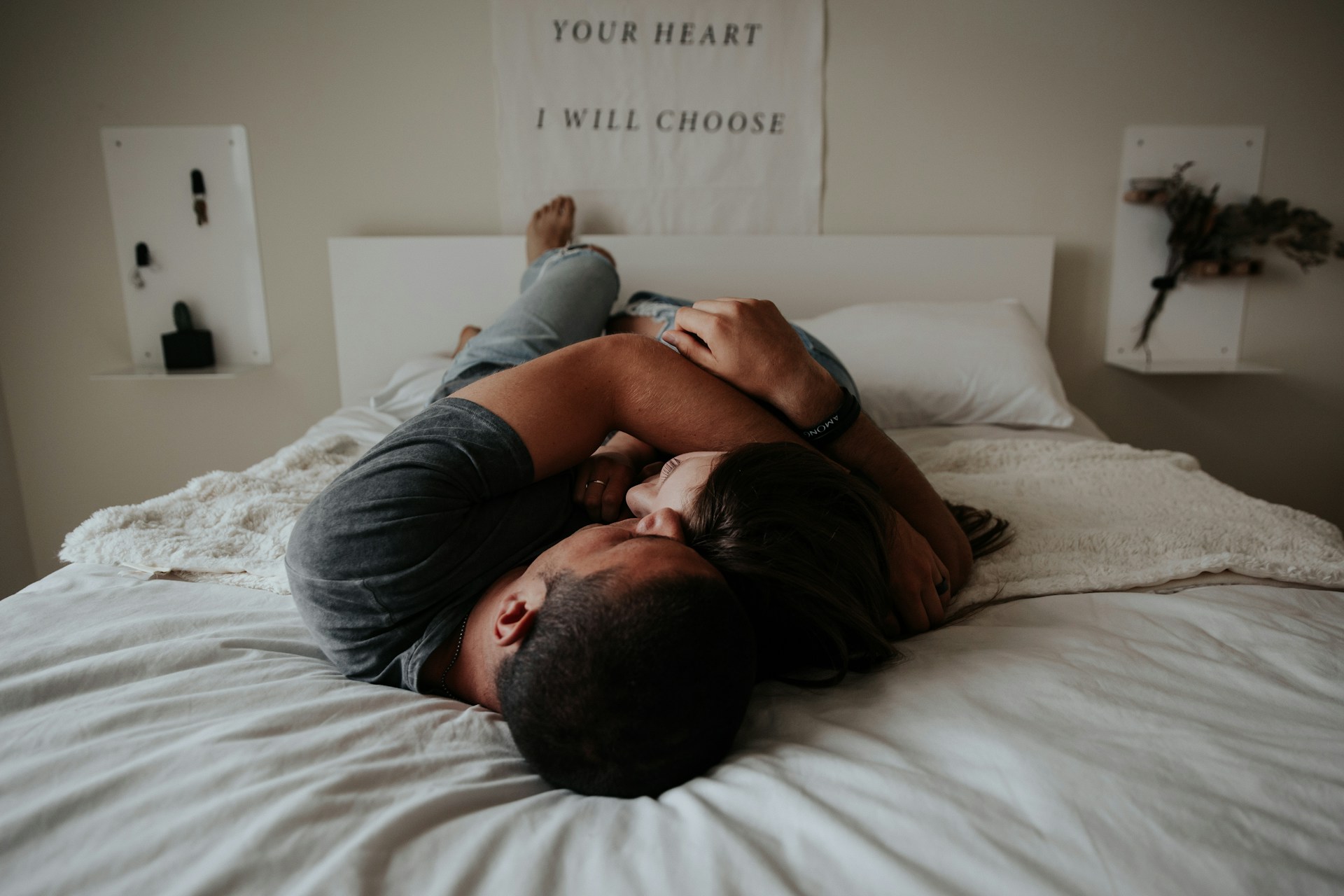 couple cuddling in bed