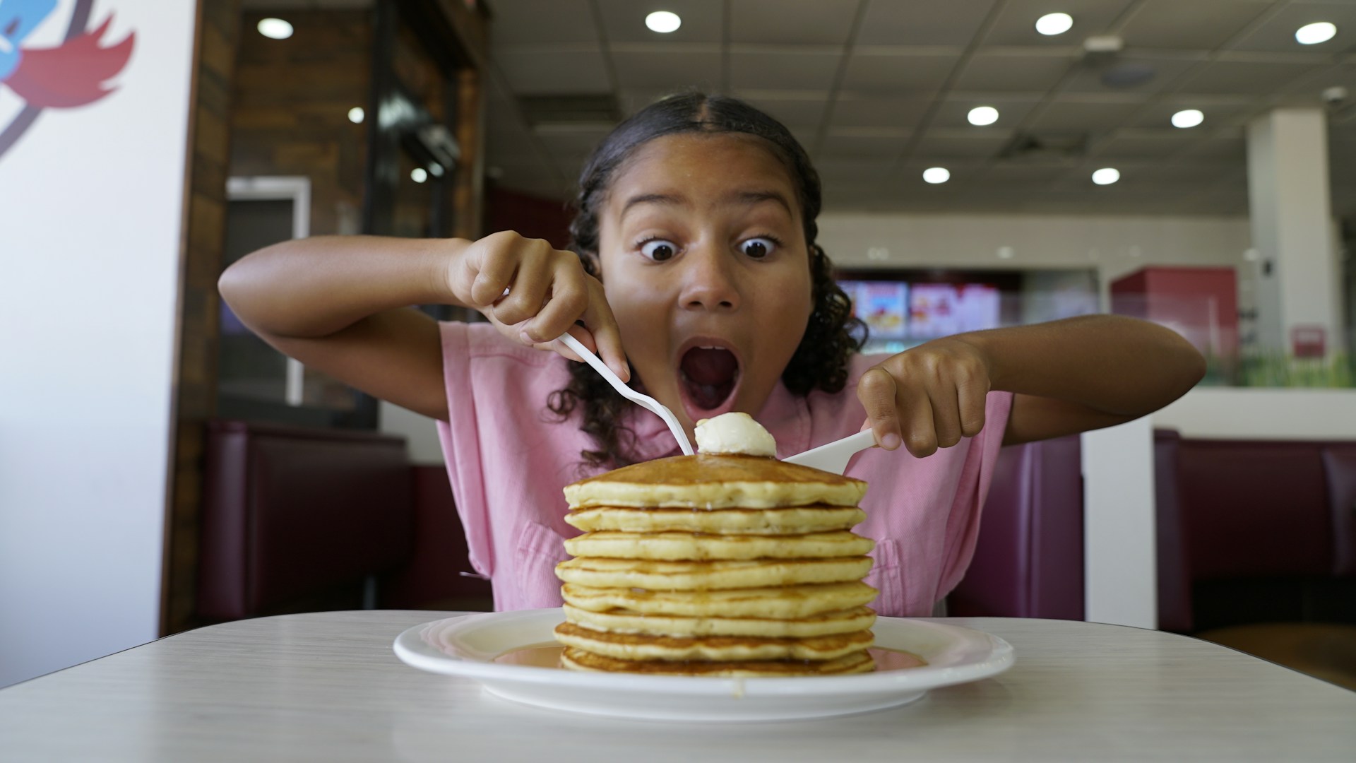 little girl with stack of pancakes / zodiac signs