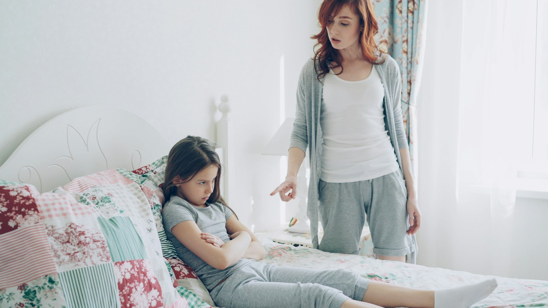 mother admonishing child