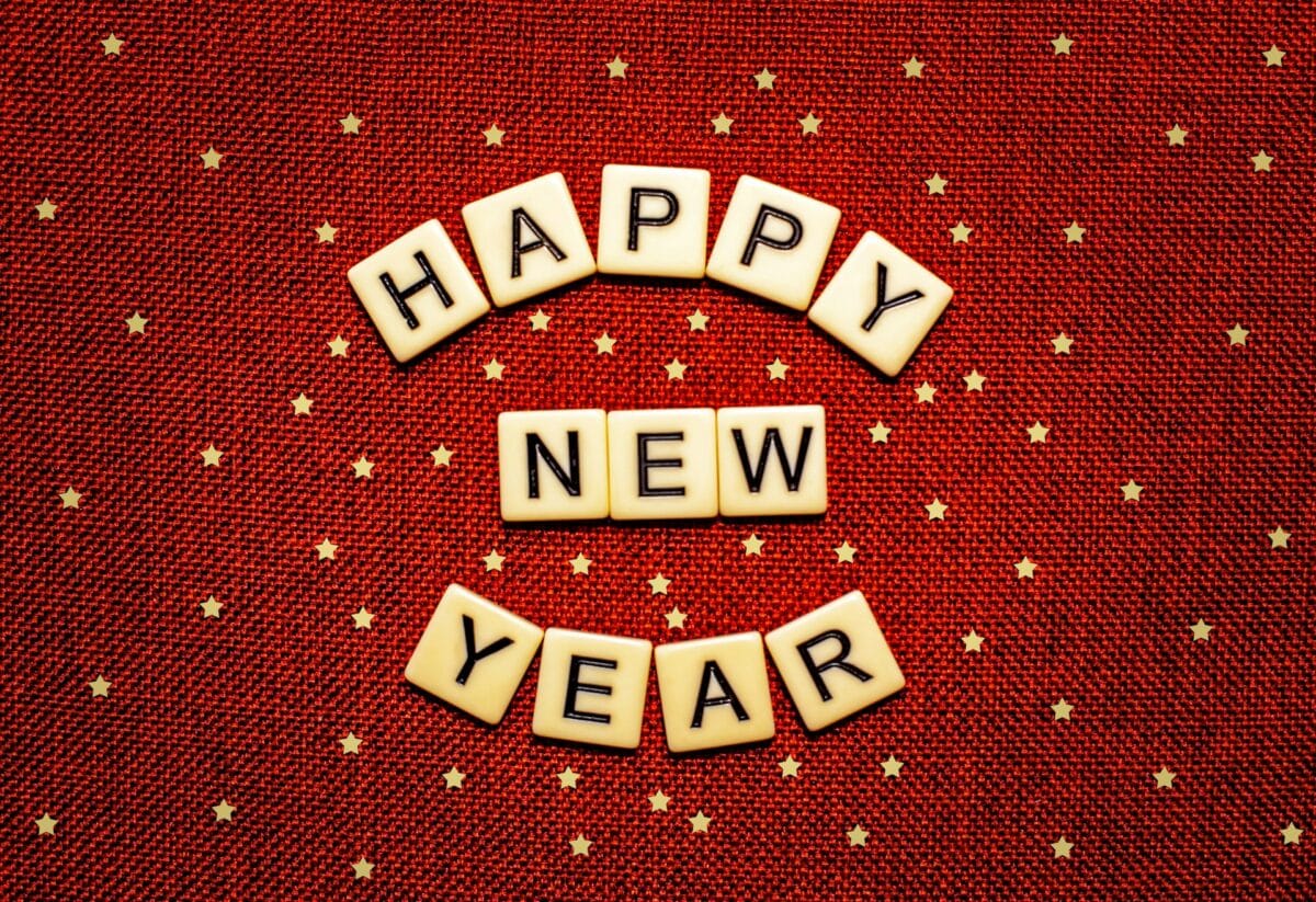 happy new year scrabble tiles red background / health habits