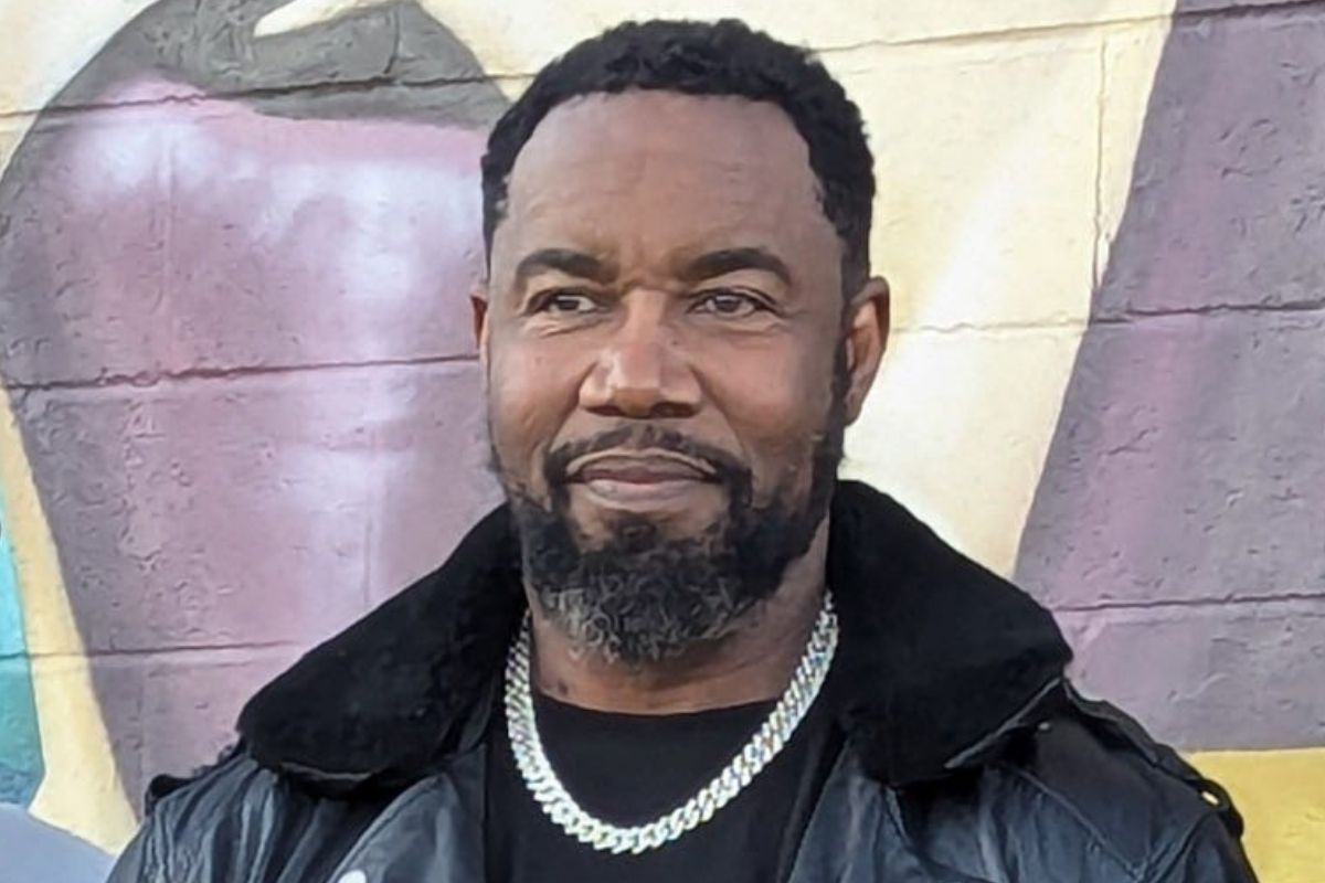 Michael Jai White (center) poses with Urban Bridge staff members outside the Bridge Impact Center in northeast Oklahoma City on Tuesday, Nov. 5, 2024.