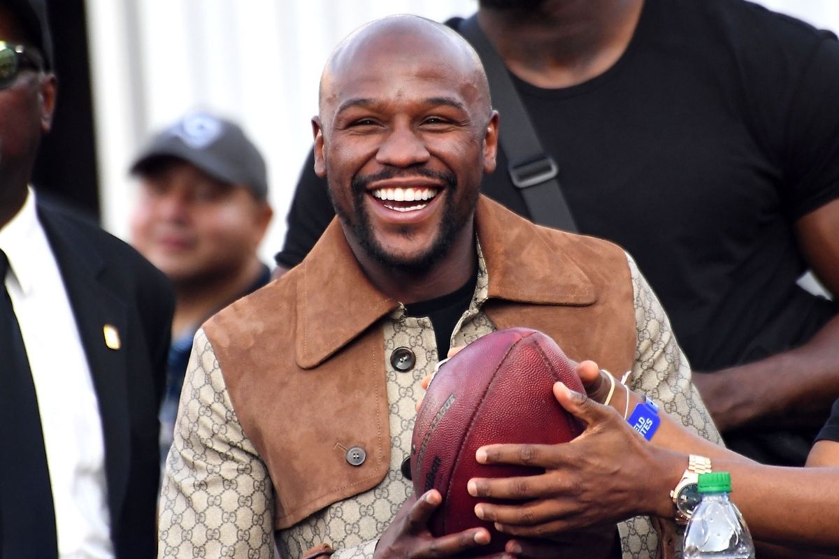 Nov 11, 2018; Los Angeles, CA, USA; Floyd Mayweather Jr. smiles after Seattle Seahawks wide receiver Tyler Lockett (not pictured) handed him the ball he caught for a touchdown in the second half of the game against the Los Angeles Rams at the Memorial Coliseum.