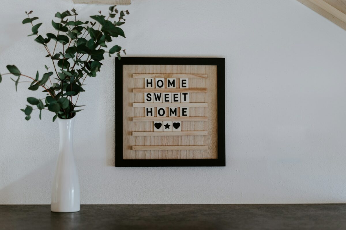 home sweet home sign with plant / zodiac signs