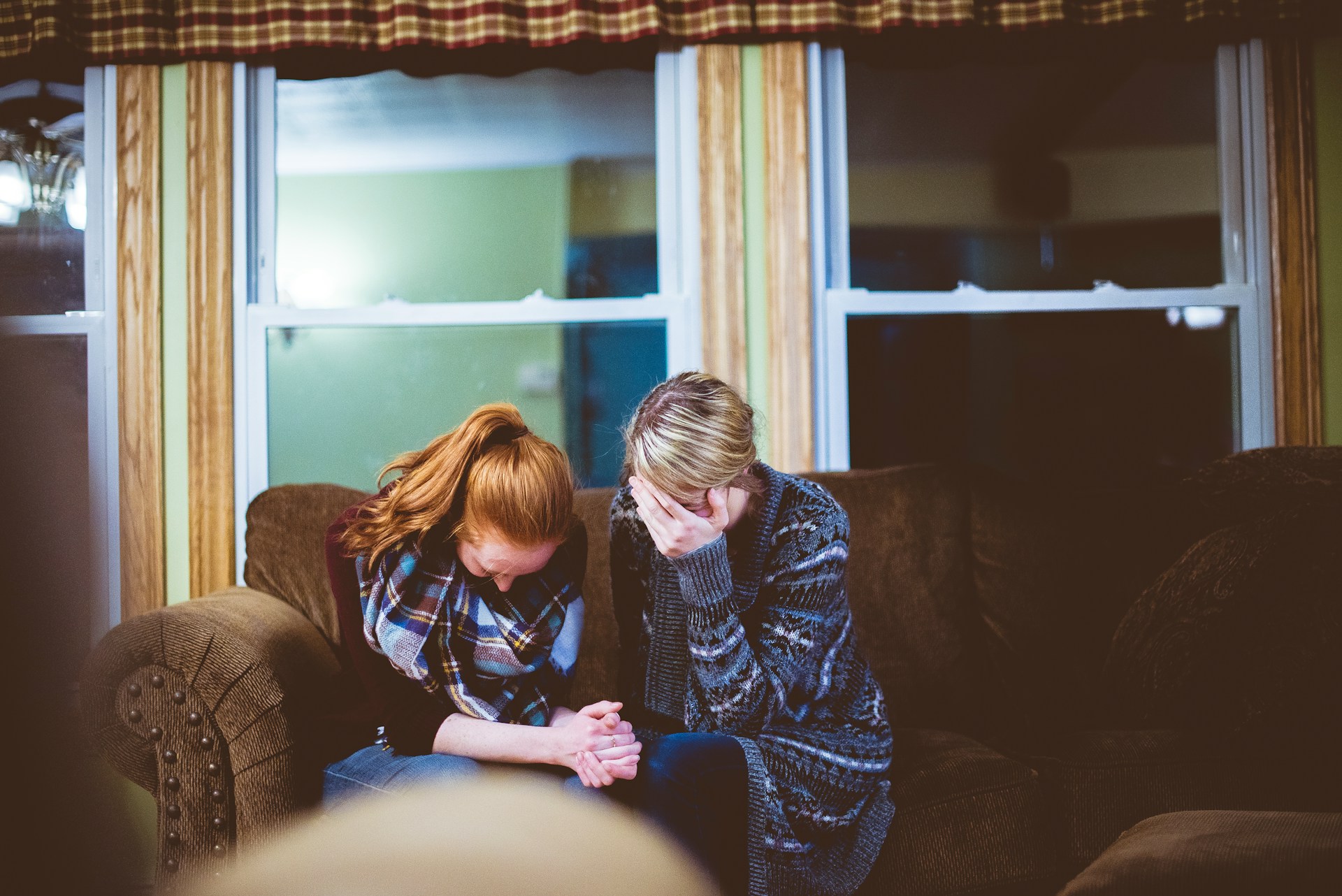 two women sitting together