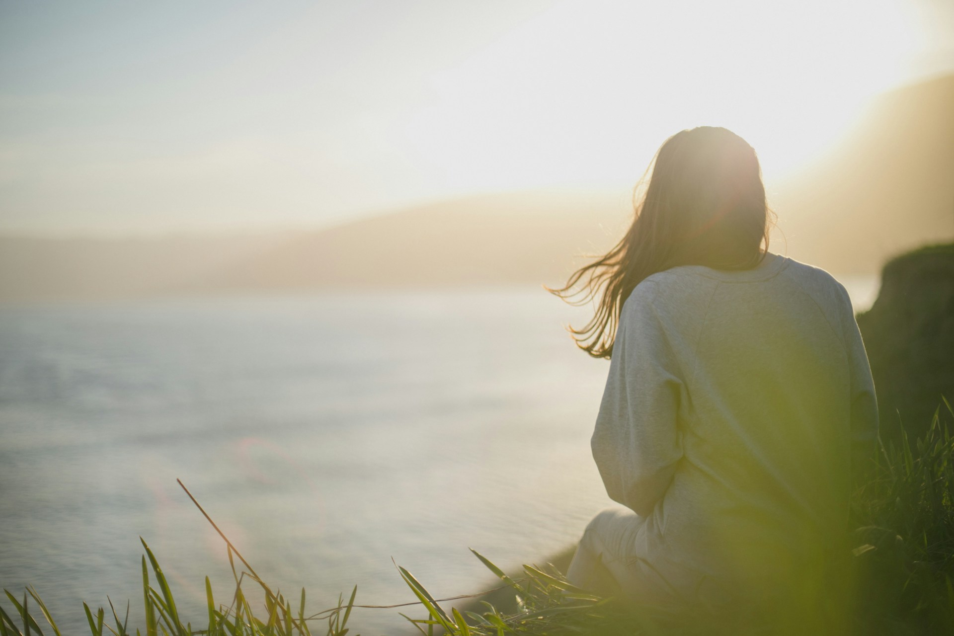 woman alone near ocean