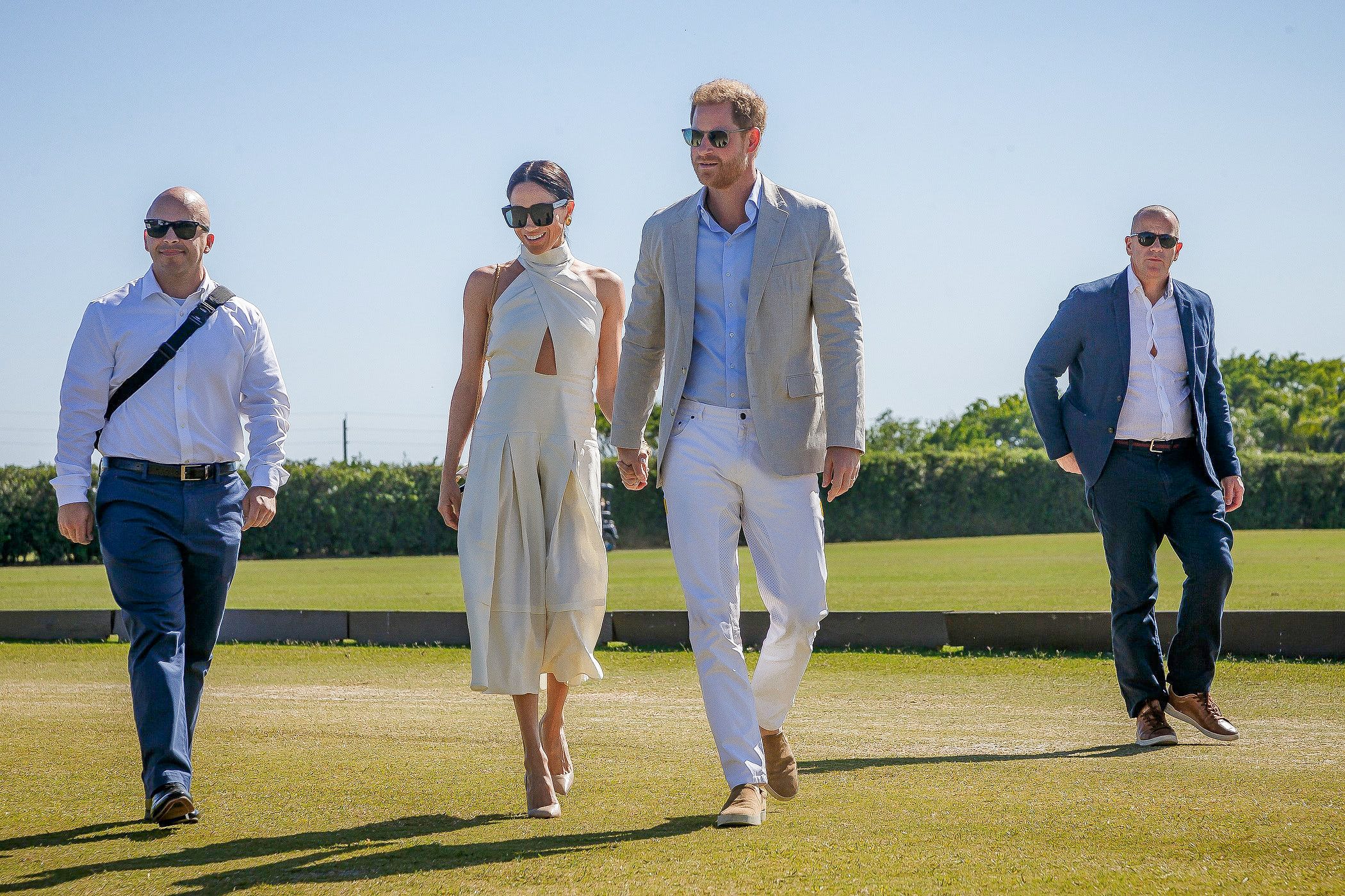 Duchess of Sussex Meghan Markle and Prince Harry, Duke of Sussex arrive at Grand Champions Polo in Wellington, Fla., on April