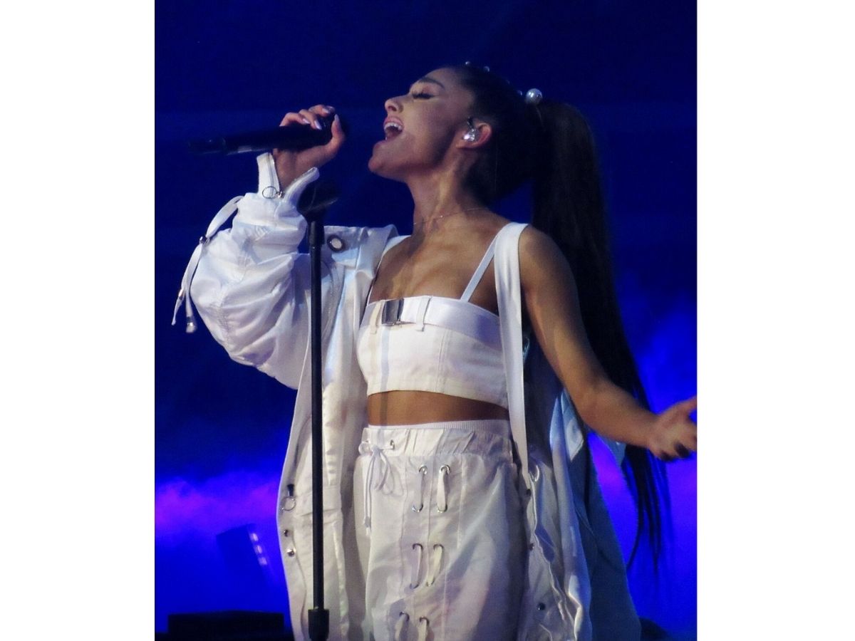 Ariana Grande singing in concert