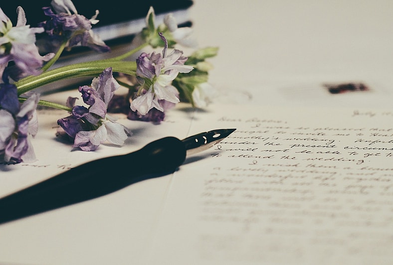 letter with pen