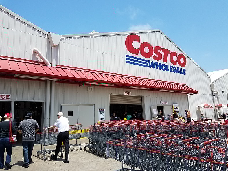 two men walking into costco