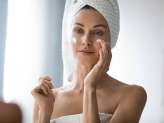 woman with face cream