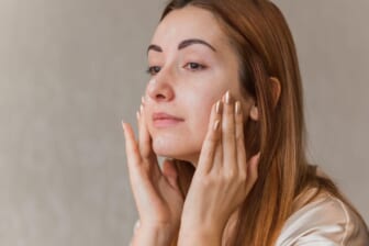 woman with face cream
