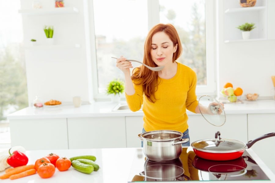 woman cooking immune-boosting habits