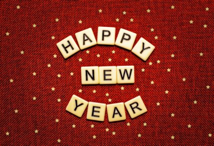 happy new year scrabble tiles red background / health habits