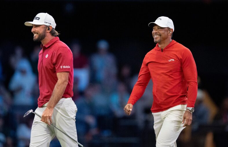 Tiger Woods and Max Homa of Jupiter Links GC celebrate the win over Boston Common Golf during TGL match at SoFi Center on March