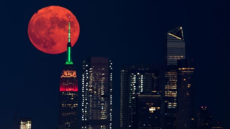 U.S. wildfires turn full moon orange 1