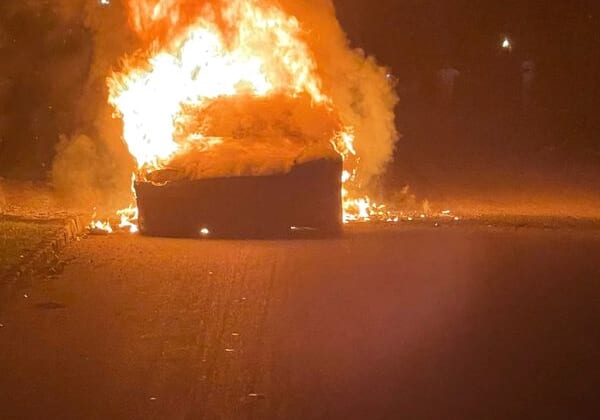 Tesla top-of-range car caught fire while owner was driving, lawyer says