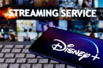 Disney crosses streaming milestone, aims to open California parks in late April